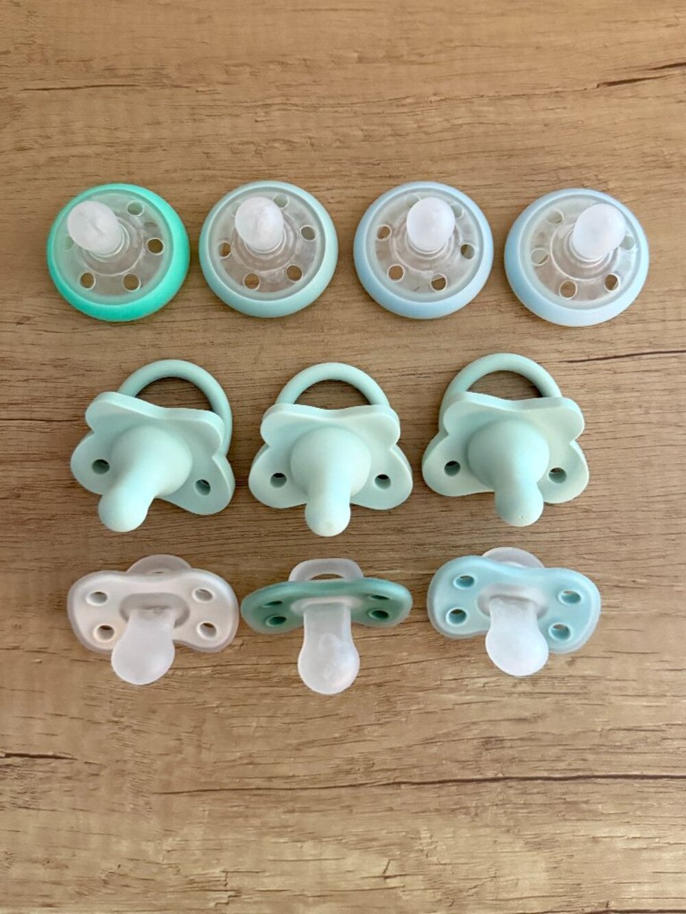 blue and green baby pacifier bundle of 10